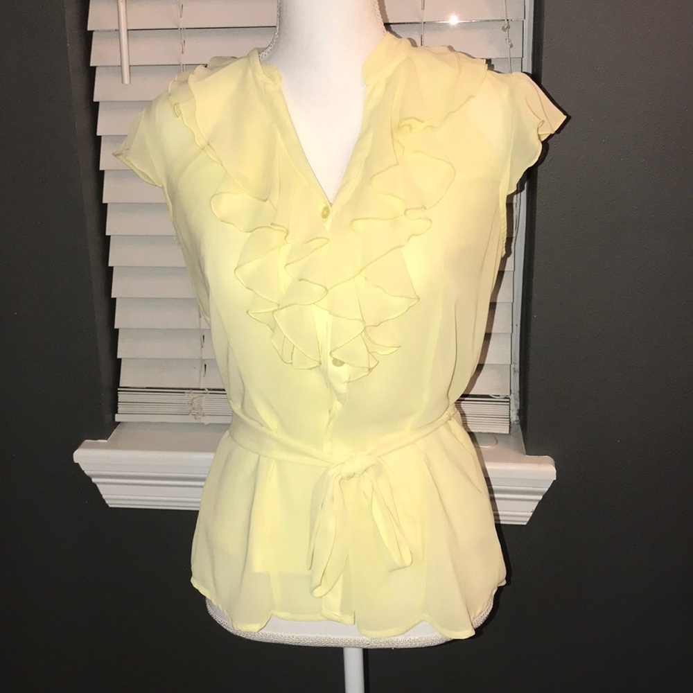 yellow button up shirt with ruffles